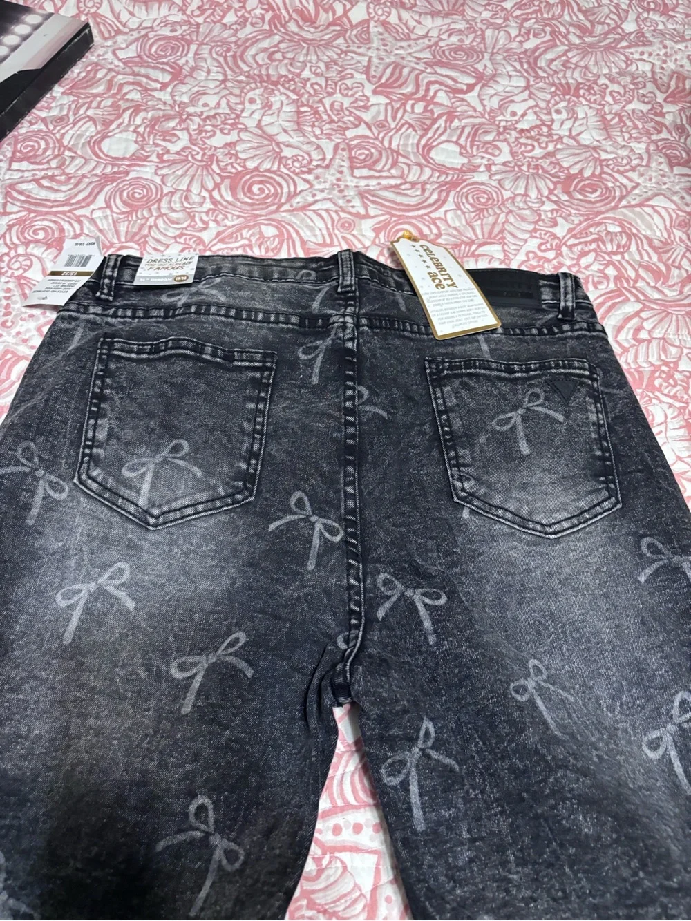 High-Rise Black Washed women Jeans with Subtle Bow Print